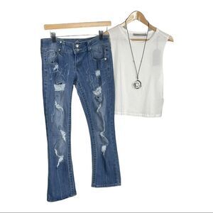 𝅺almost Famous Distressed Jeans with Decorative Pockets size 7